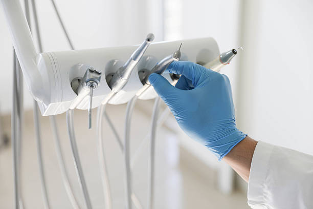 Professional Dental Implants technician working in Moodus, CT